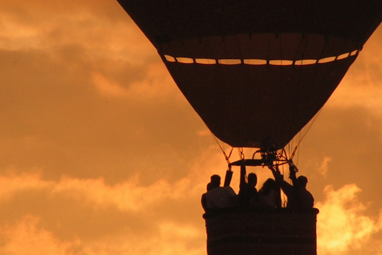 hot air balloon over tuscany